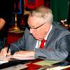 Bill Rauscher signing his new book on Silent Mora